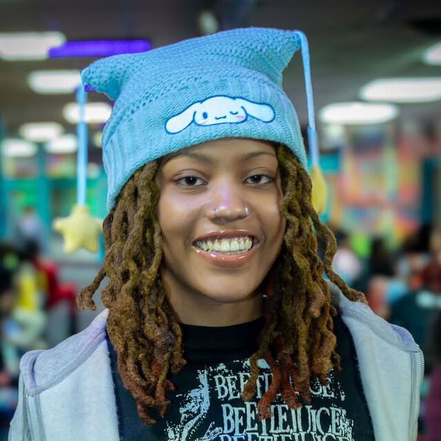 Mona Moore, owner and stylist at MomoLocs